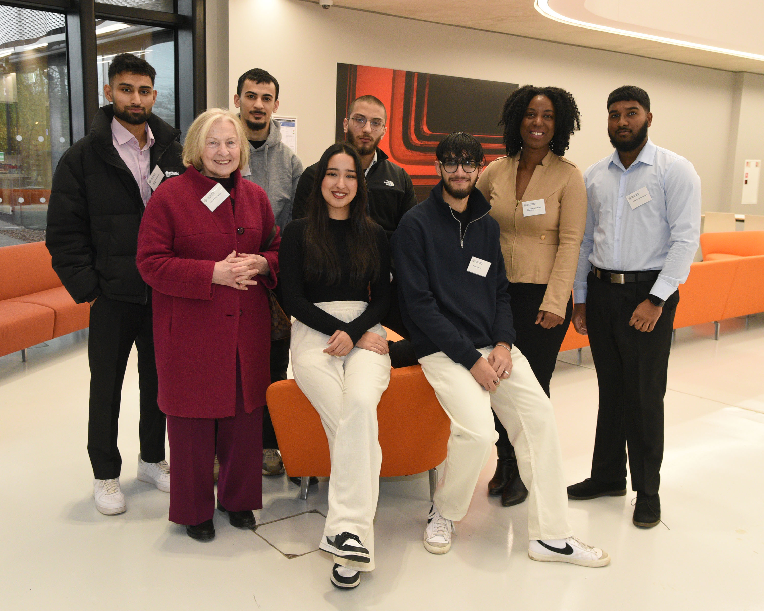 Two of the latest recipients of Lord Bhattacharyya HE bursaries, Saara Hussain and Wafiq Hussain (seated front row), at the celebration in Coventry with Lady Bhattacharyya (second left), keynote speaker Yewande Akinola MBE HonFREng (second right), and past recipients of HE bursaries, Mohammed Akther; Saman Salih; Dawud Ahmed and Dylenda Sooryamuyah (back row).