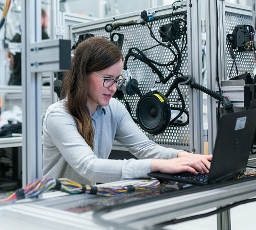 Female electronics engineer runs vehicle tests