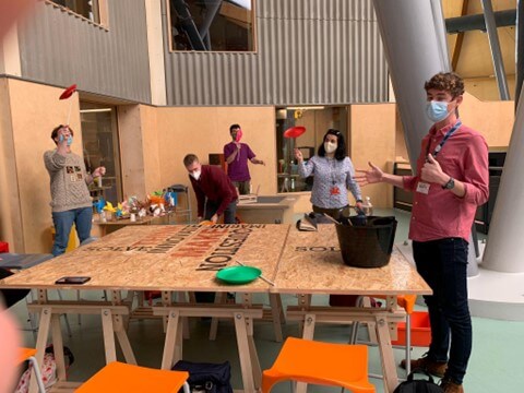 Build-a-Bear - people by tables preparing in workshop