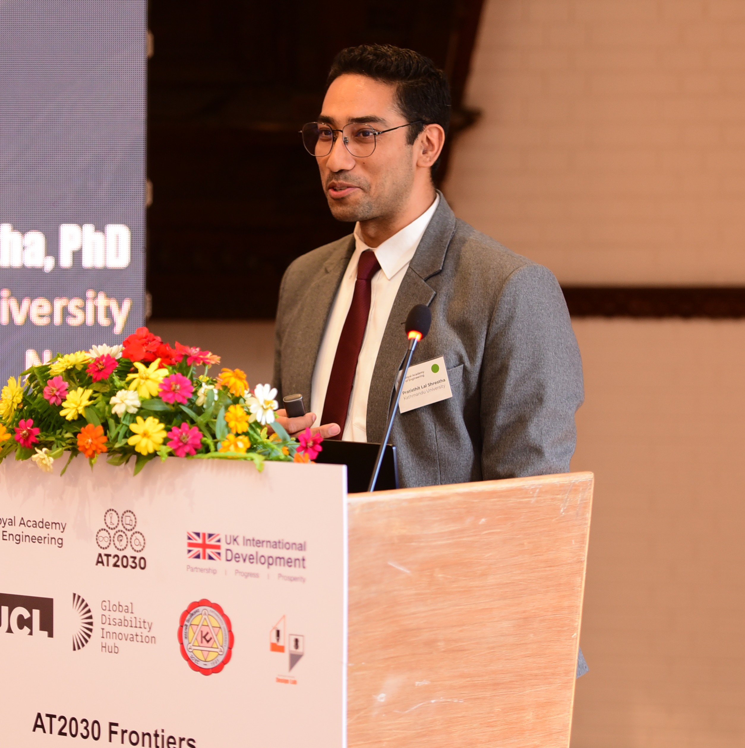 Dr Pratisthit Shrestha presenting