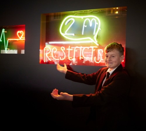 Year 10 students from Durham Federation school with Lucie Brownlee and Neon workshop. Lumiere 2021, produced by Artichoke. Photo - Matthew Andrews