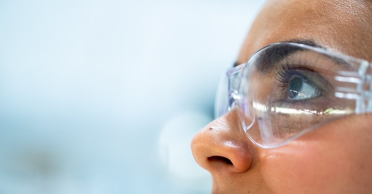 woman chemical engineer with protective eyewear
