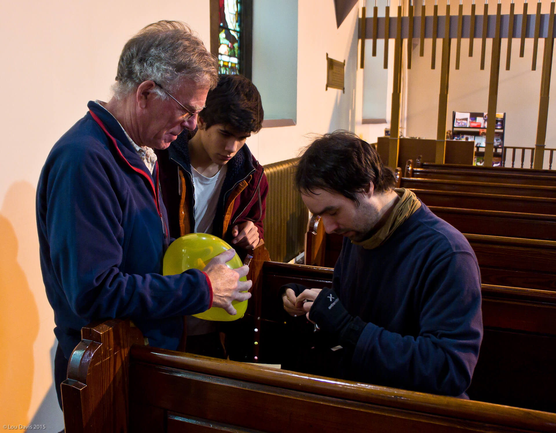 Engineers examining heat loss in church