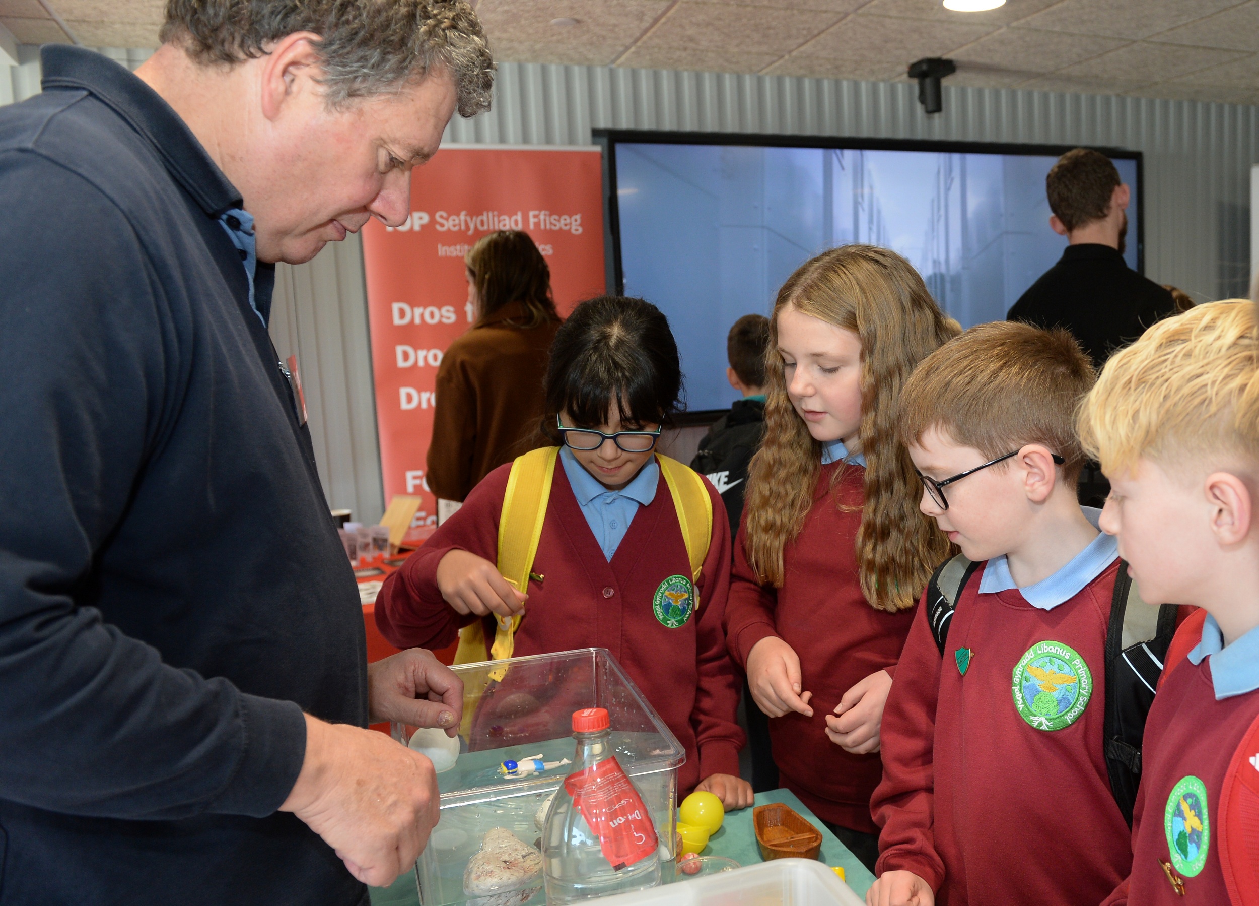 School pupils taking part in an engineering demonstration