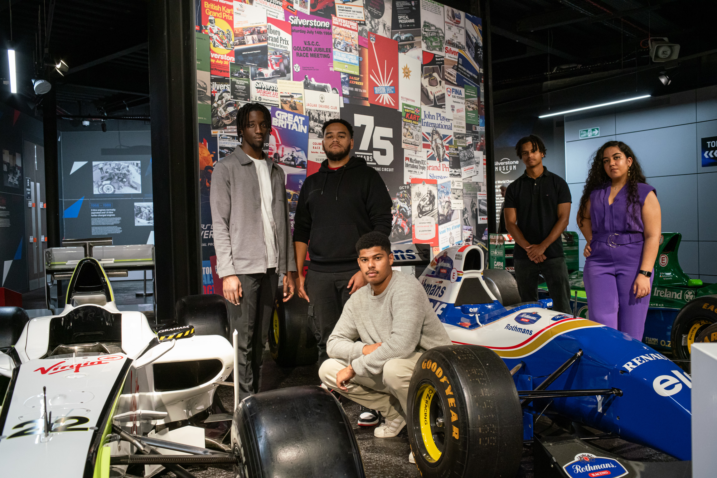 The five recipients of the first MSc motorsport engineering scholarships during their visit to the Silverstone Museum.  From left to right: Jonathan Keeya, Amjad Saeed, Nevin Hall, Benjamin Woodhouse, and Laila Fadli Dokkali