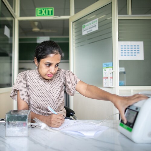 An entrepreneur can be seen engaging with their innovation.