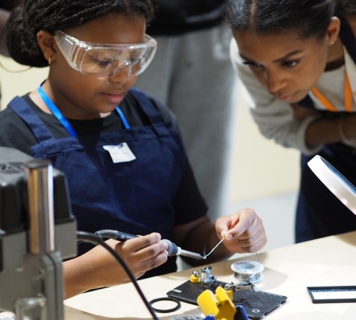 Two students doing an electronics activity